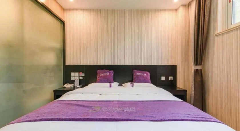 Bed in City 118 Hotel Qingdao Boardcast Tower