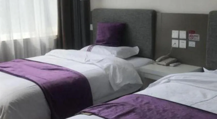 Bed in City 118 Hotel Qingdao Boardcast Tower