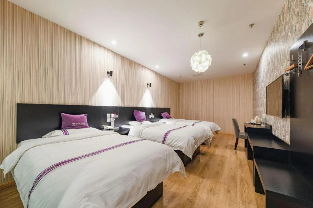 Bed in City 118 Hotel Qingdao Boardcast Tower