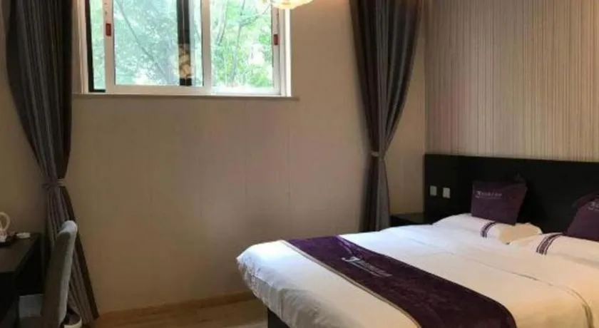 Bed in City 118 Hotel Qingdao Boardcast Tower