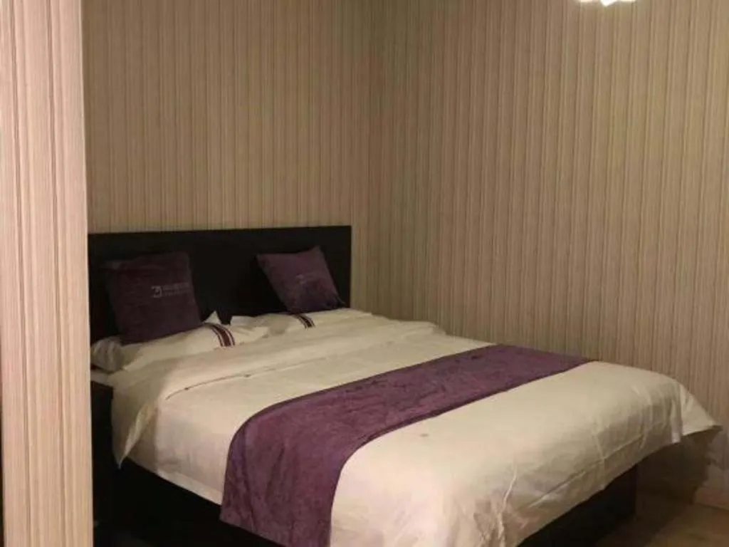 Bed in City 118 Hotel Qingdao Boardcast Tower