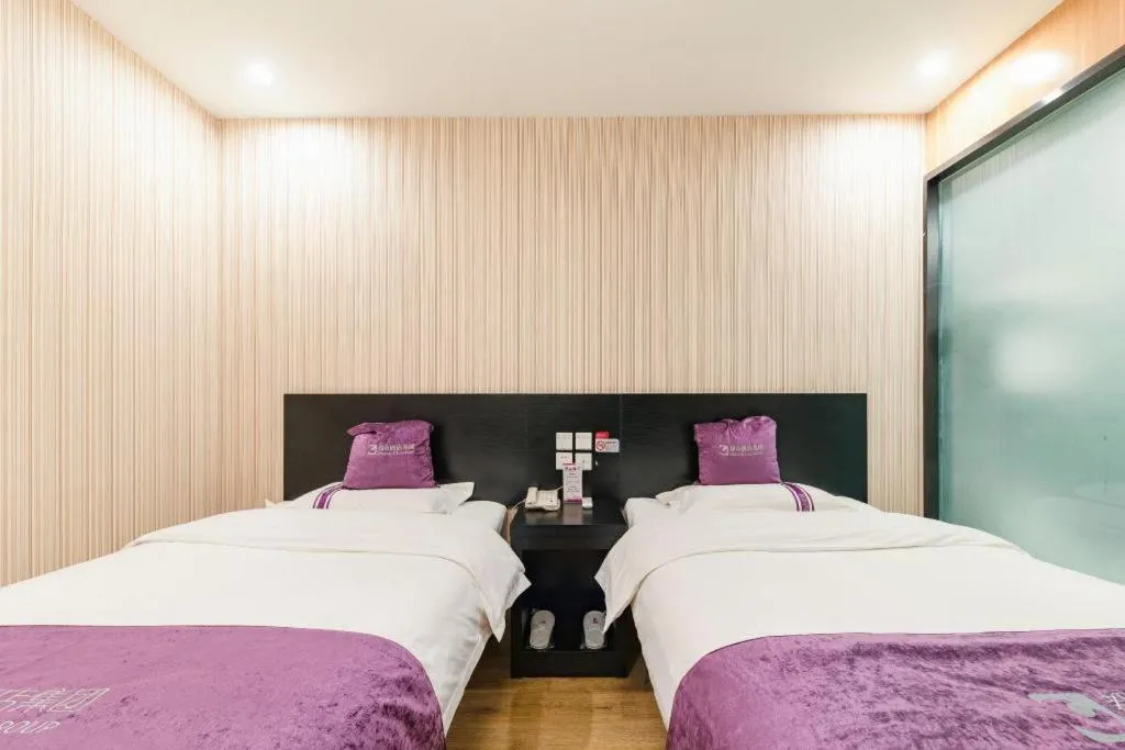 Bed in City 118 Hotel Qingdao Boardcast Tower