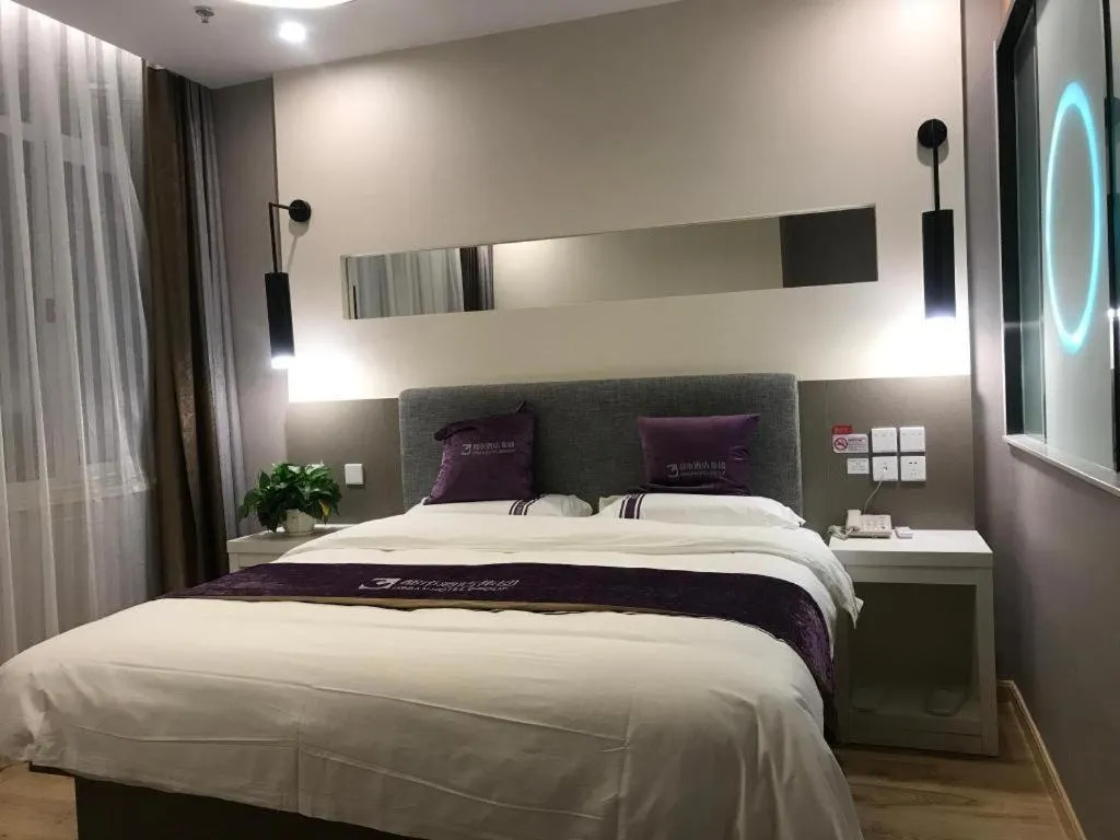 Bed in City 118 Hotel Qingdao Boardcast Tower