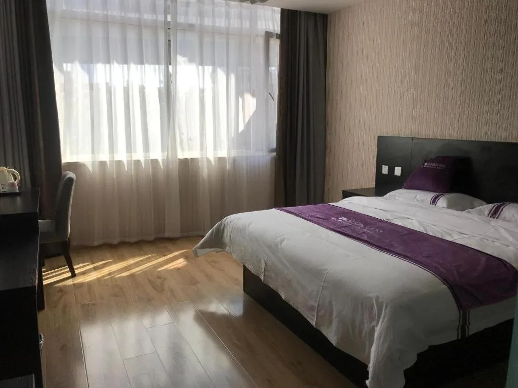 Bed in City 118 Hotel Qingdao Boardcast Tower