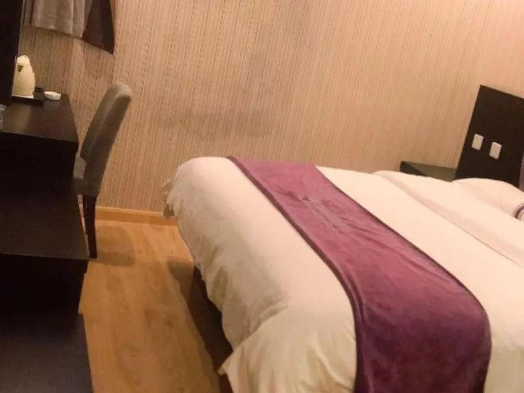 Bed in City 118 Hotel Qingdao Boardcast Tower