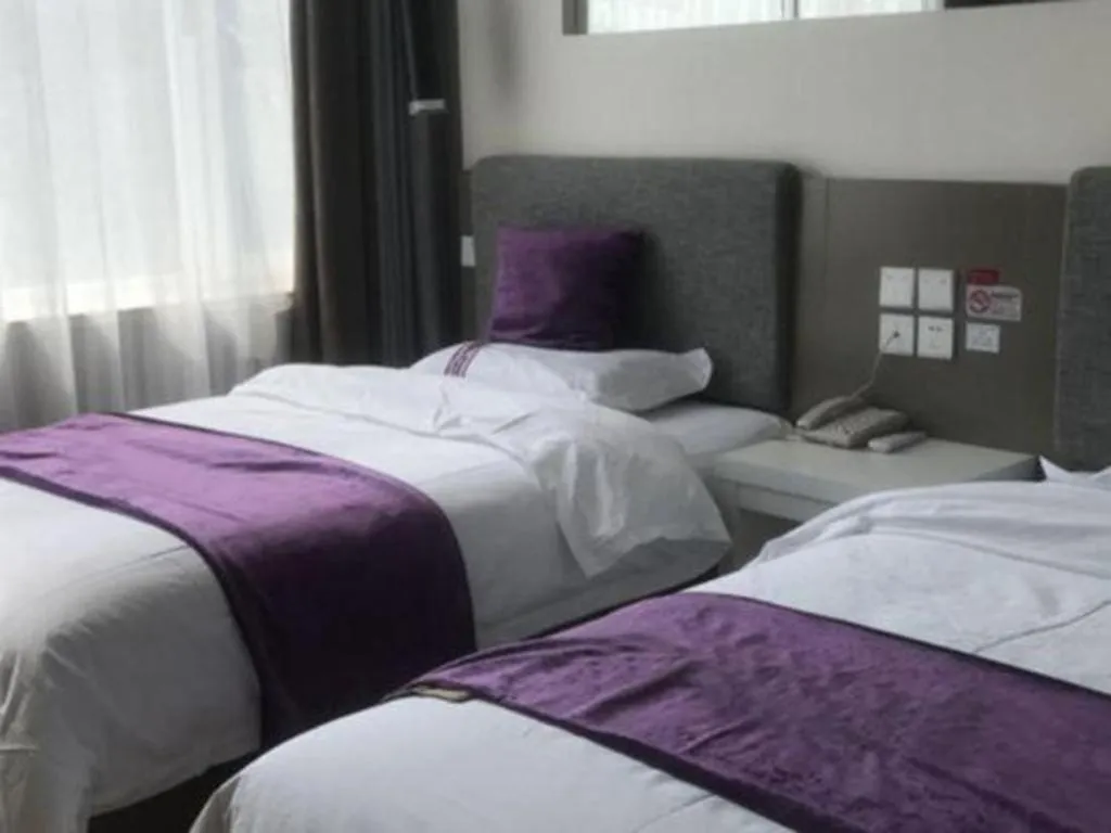 Bed in City 118 Hotel Qingdao Boardcast Tower