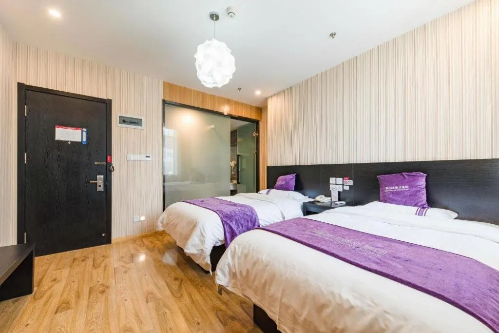 Bed in City 118 Hotel Qingdao Boardcast Tower