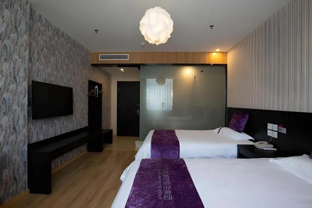 Bed in City 118 Hotel Qingdao Boardcast Tower