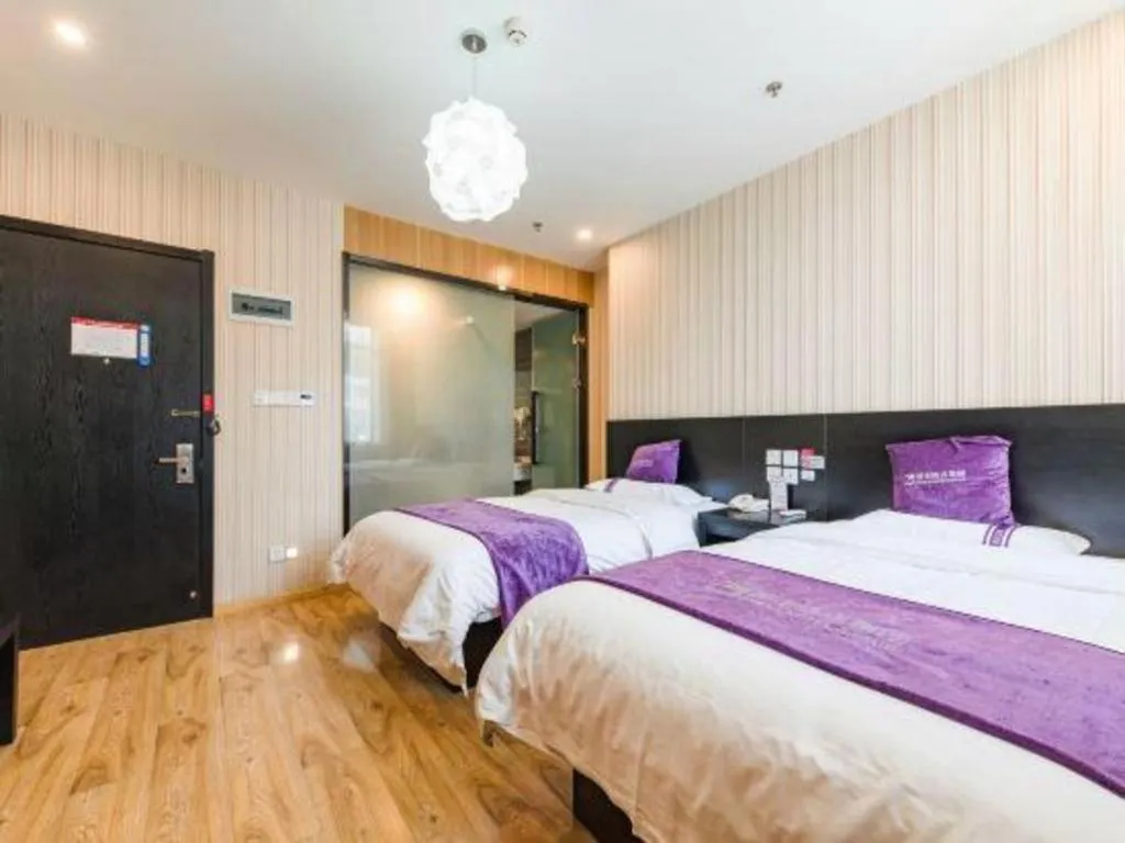 Bed in City 118 Hotel Qingdao Boardcast Tower