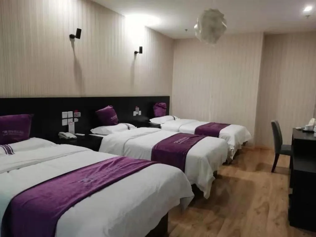Bed in City 118 Hotel Qingdao Boardcast Tower