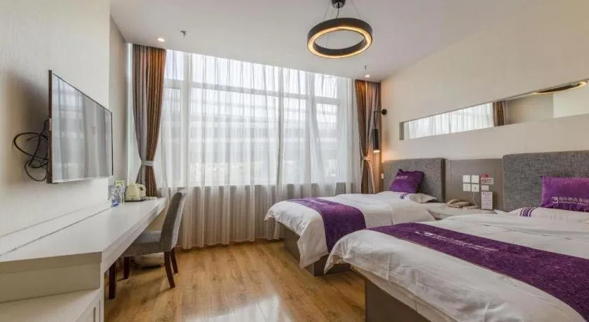 Bed in City 118 Hotel Qingdao Boardcast Tower