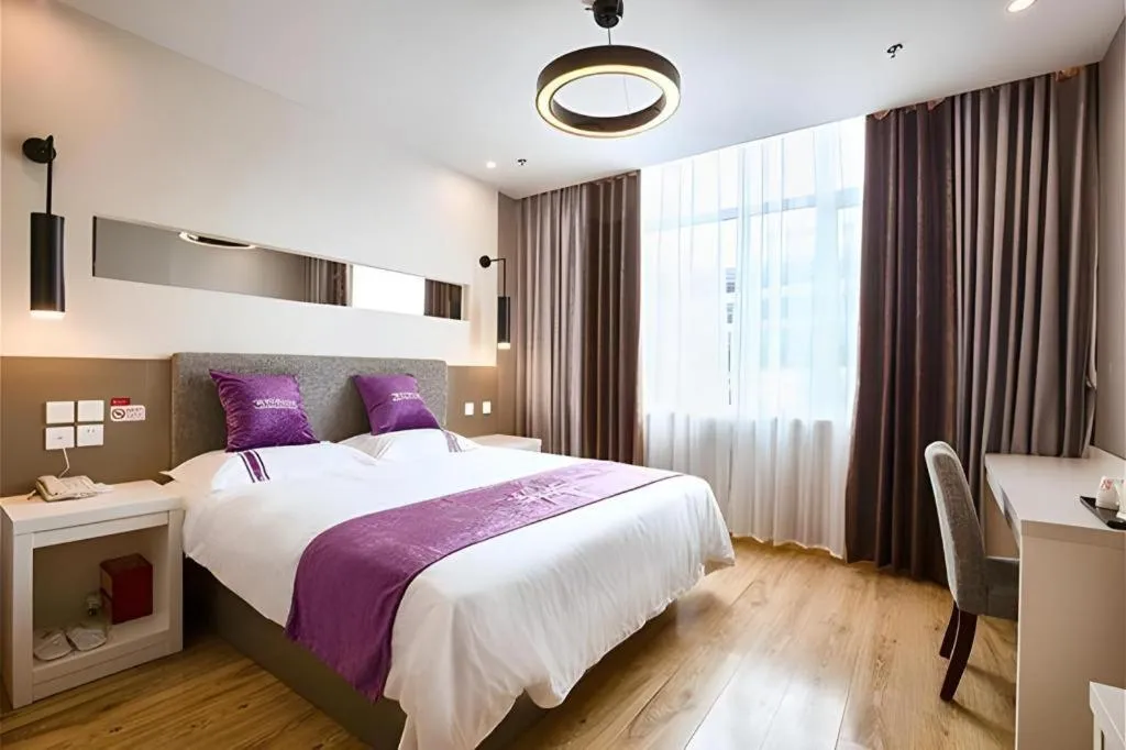 Bed in City 118 Hotel Qingdao Boardcast Tower