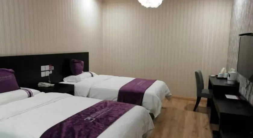 Bed in City 118 Hotel Qingdao Boardcast Tower
