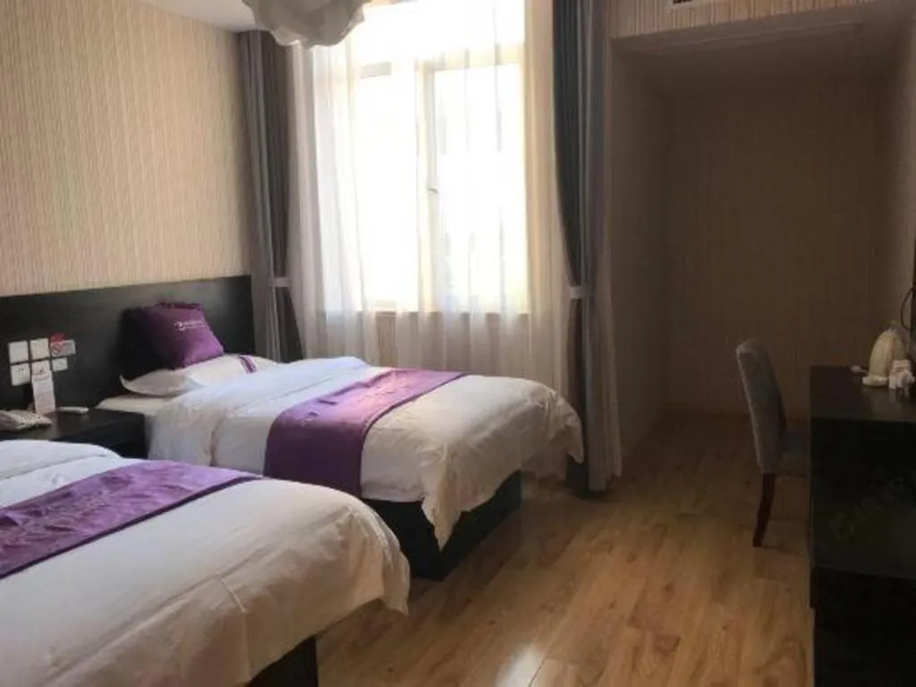 Bed in City 118 Hotel Qingdao Boardcast Tower