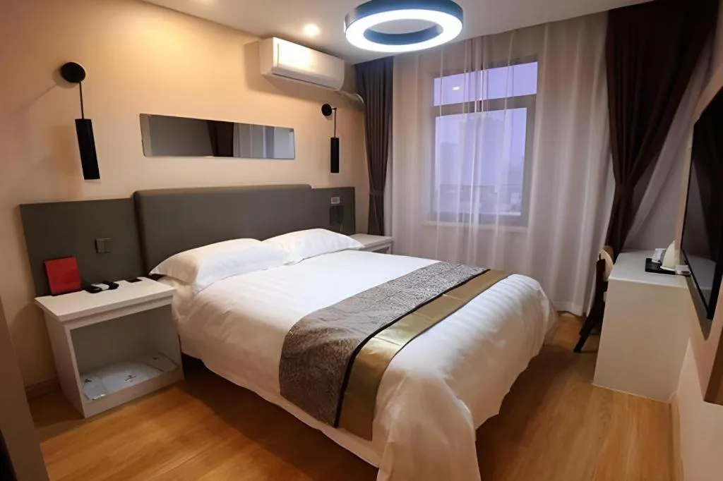 Bed in City 118 Hotel Qingdao Boardcast Tower