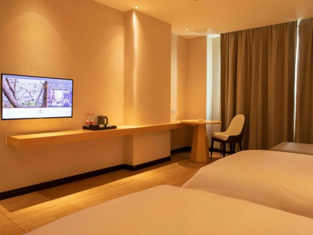 Bed in Borrman Hotel Dongguan Zhongtang