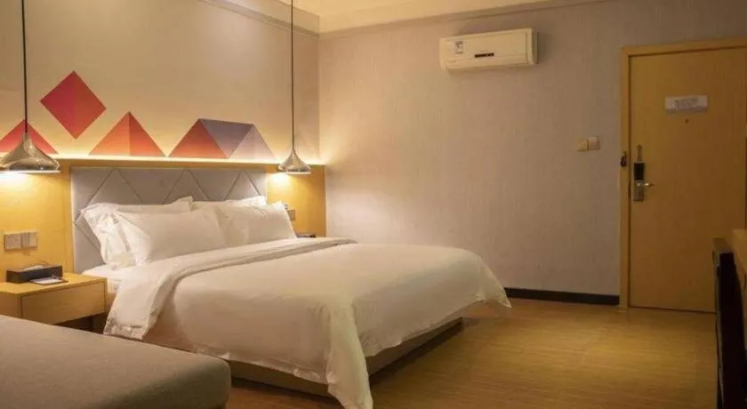 Bed in Borrman Hotel Dongguan Zhongtang