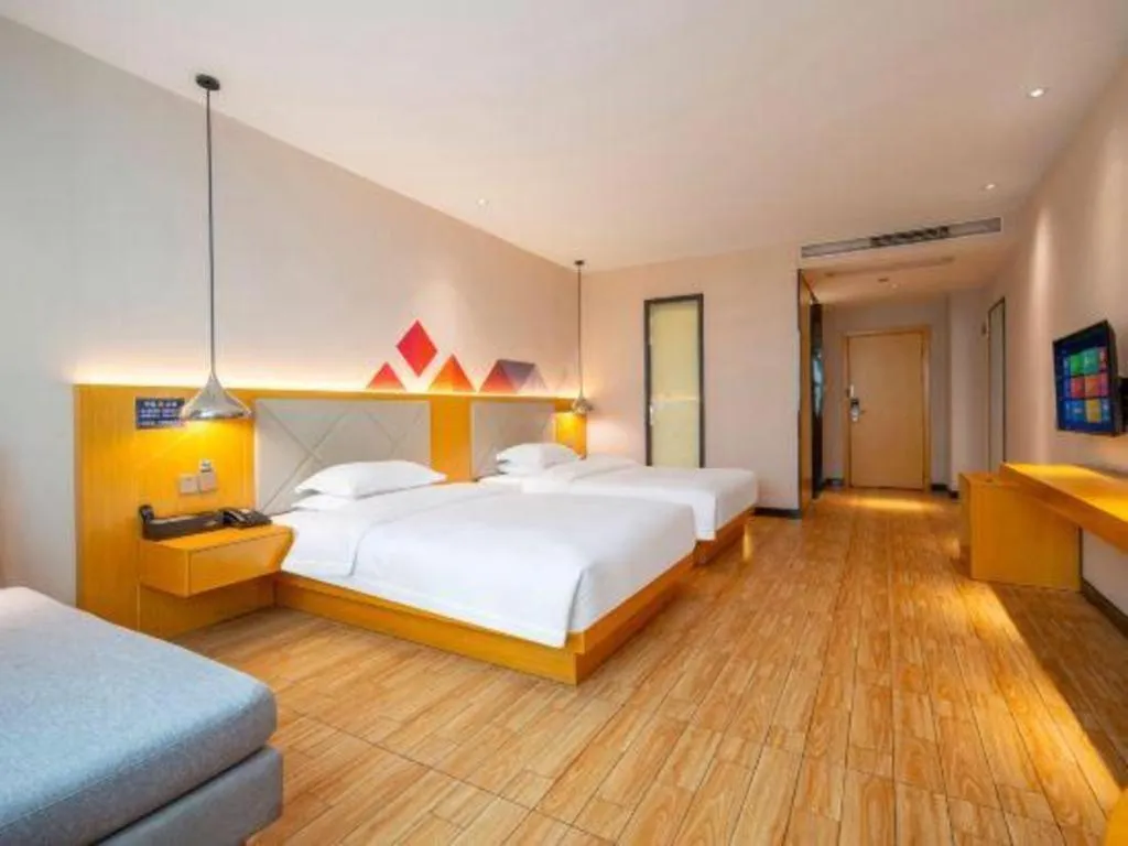 Bed in Borrman Hotel Dongguan Zhongtang