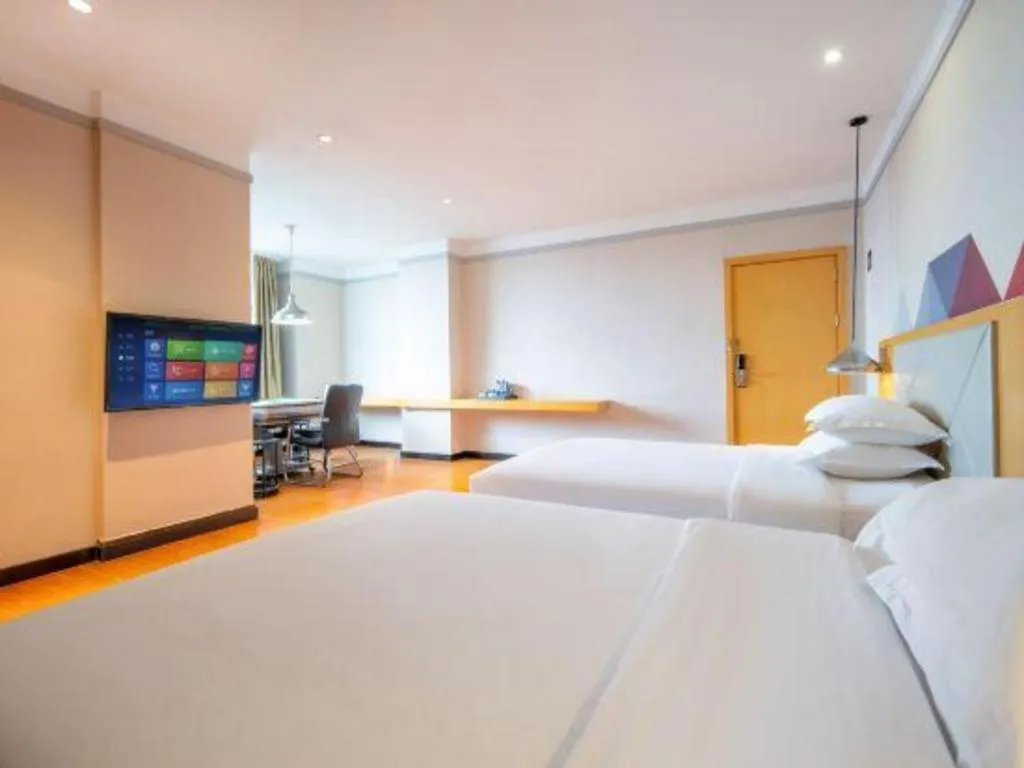 Bed in Borrman Hotel Dongguan Zhongtang