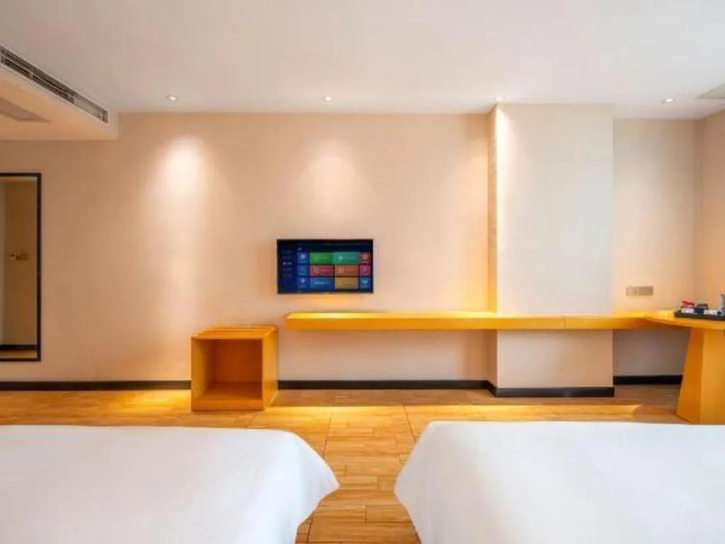 Bed in Borrman Hotel Dongguan Zhongtang