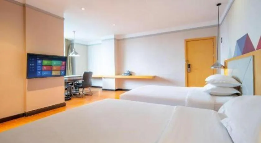 Bed in Borrman Hotel Dongguan Zhongtang