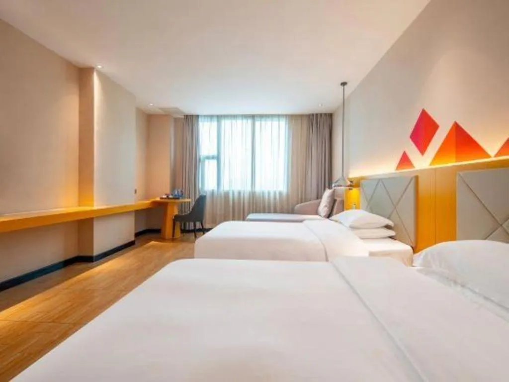 Bed in Borrman Hotel Dongguan Zhongtang