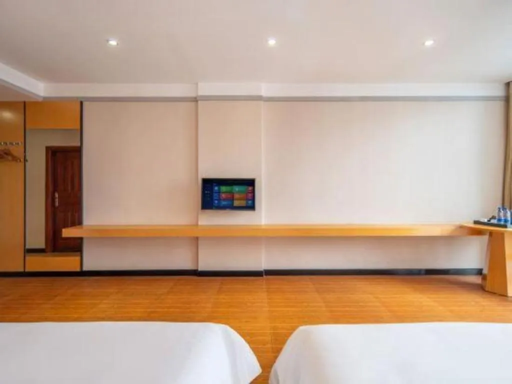 Bed in Borrman Hotel Dongguan Zhongtang