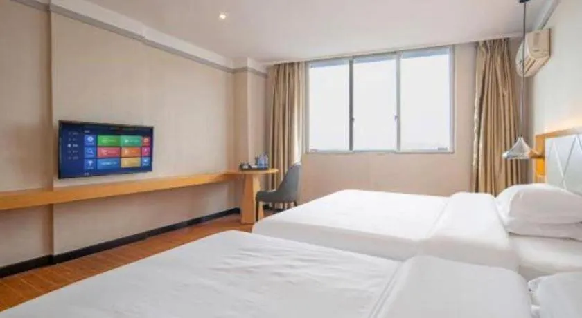 Bed in Borrman Hotel Dongguan Zhongtang