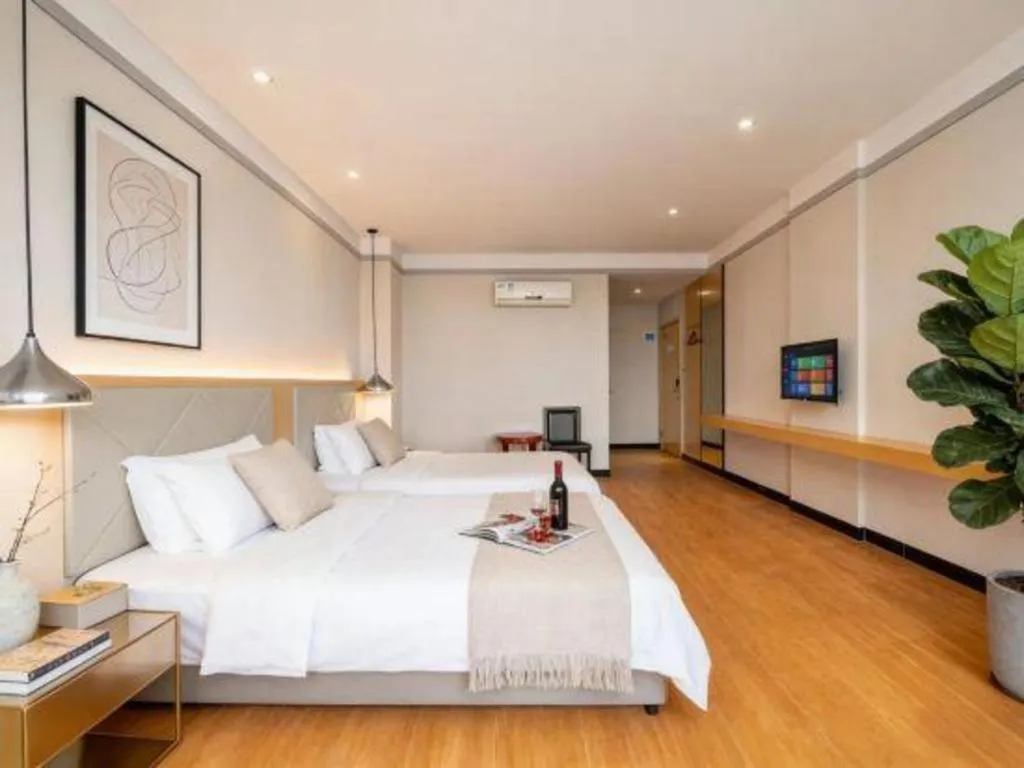 Bed in Borrman Hotel Dongguan Zhongtang