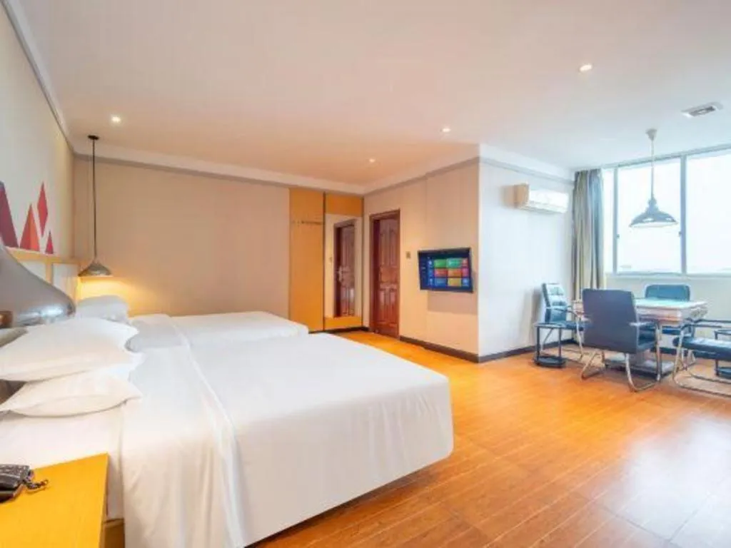 Bed in Borrman Hotel Dongguan Zhongtang