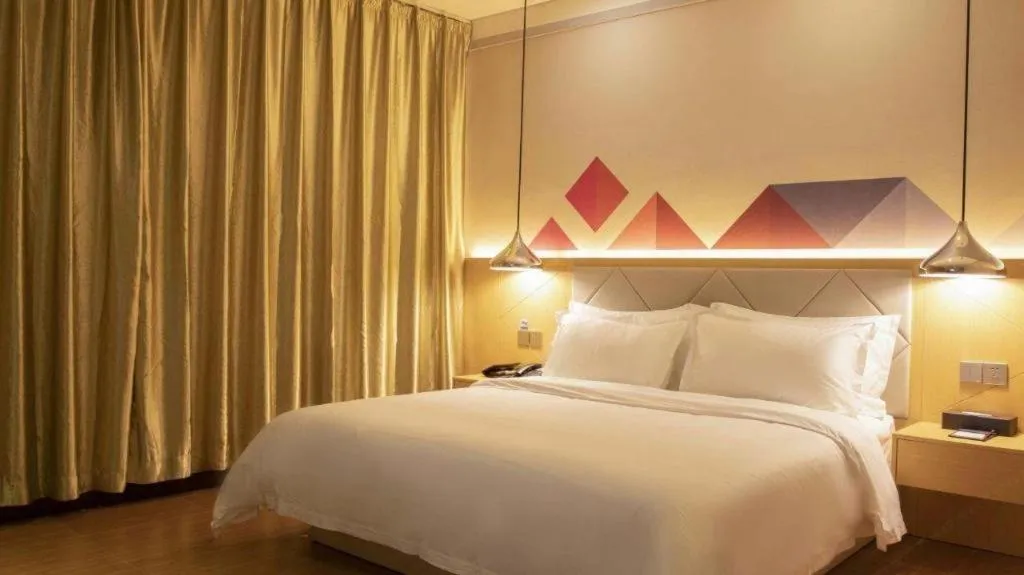 Bed in Borrman Hotel Dongguan Zhongtang