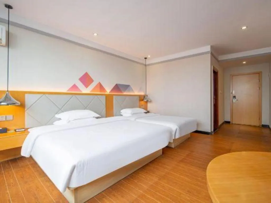 Bed in Borrman Hotel Dongguan Zhongtang