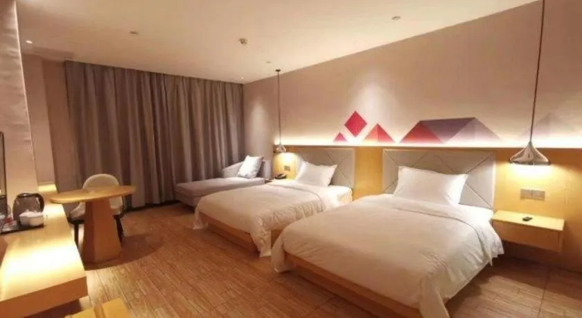 Bed in Borrman Hotel Dongguan Zhongtang