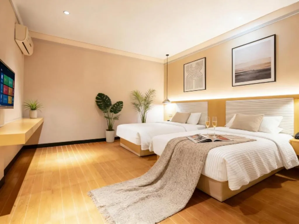 Bed in Borrman Hotel Dongguan Zhongtang