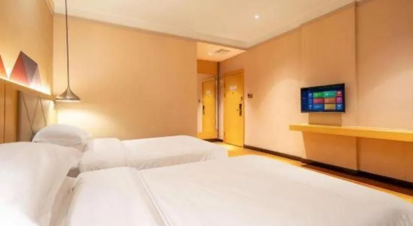 Bed in Borrman Hotel Dongguan Zhongtang