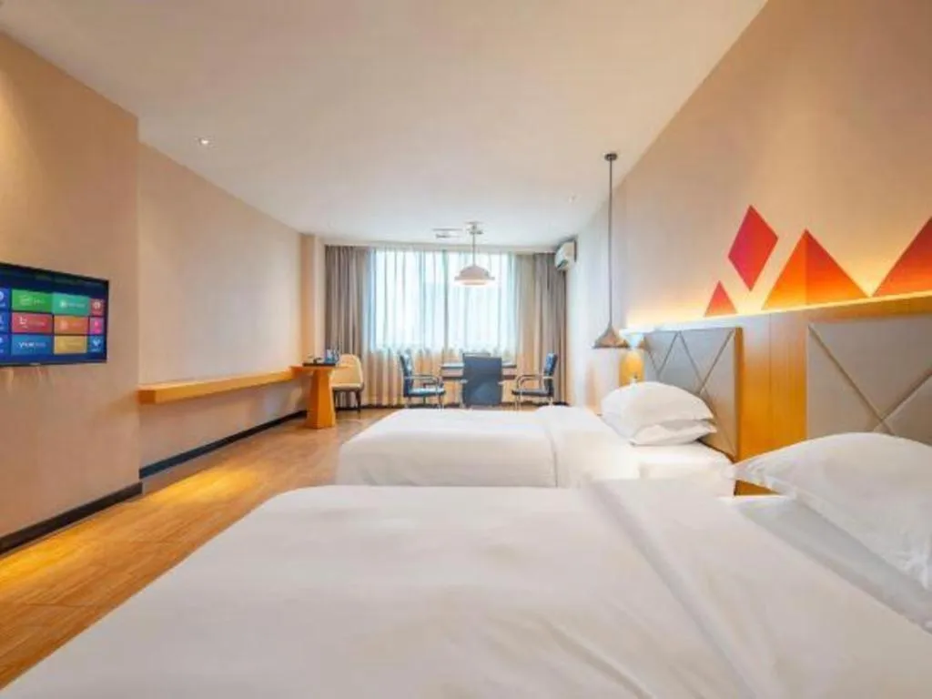 Bed in Borrman Hotel Dongguan Zhongtang