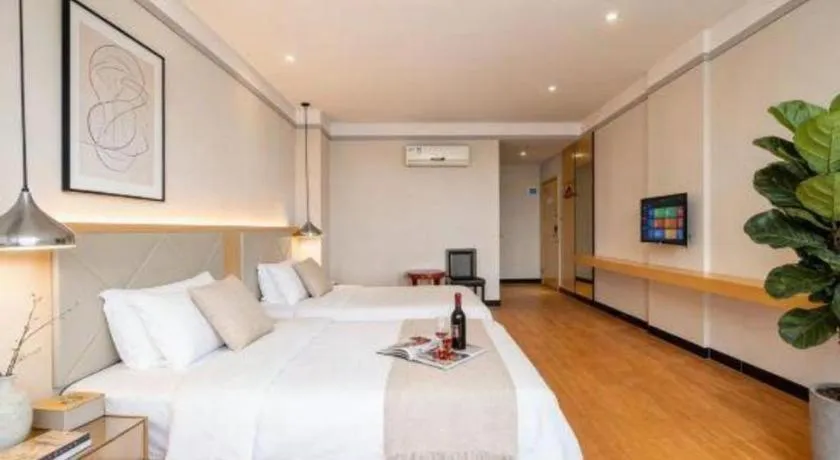 Bed in Borrman Hotel Dongguan Zhongtang