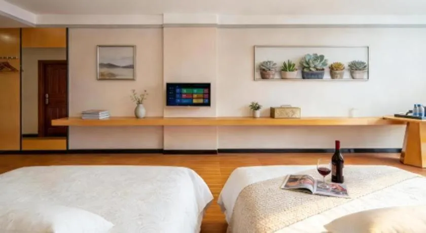 Bed in Borrman Hotel Dongguan Zhongtang