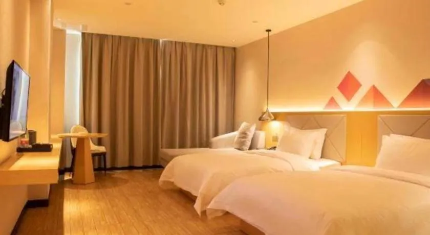 Bed in Borrman Hotel Dongguan Zhongtang