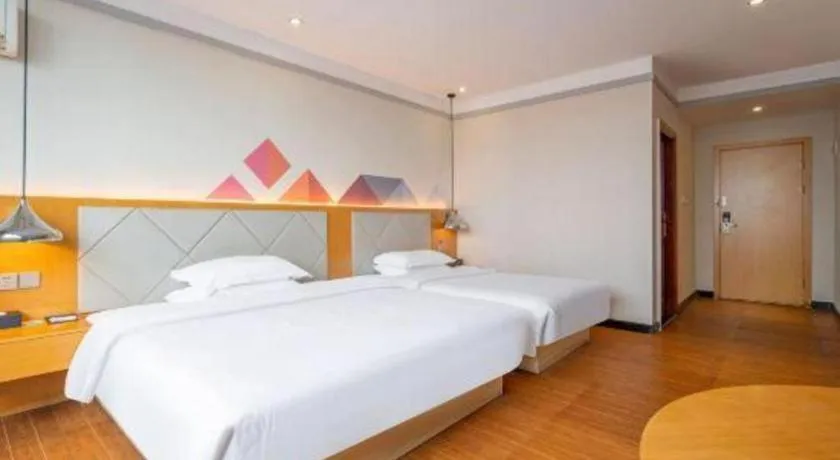 Bed in Borrman Hotel Dongguan Zhongtang