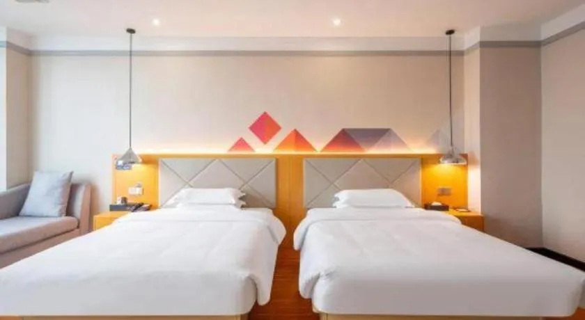 Bed in Borrman Hotel Dongguan Zhongtang