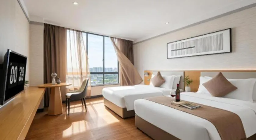 Bed in Borrman Hotel Dongguan Zhongtang