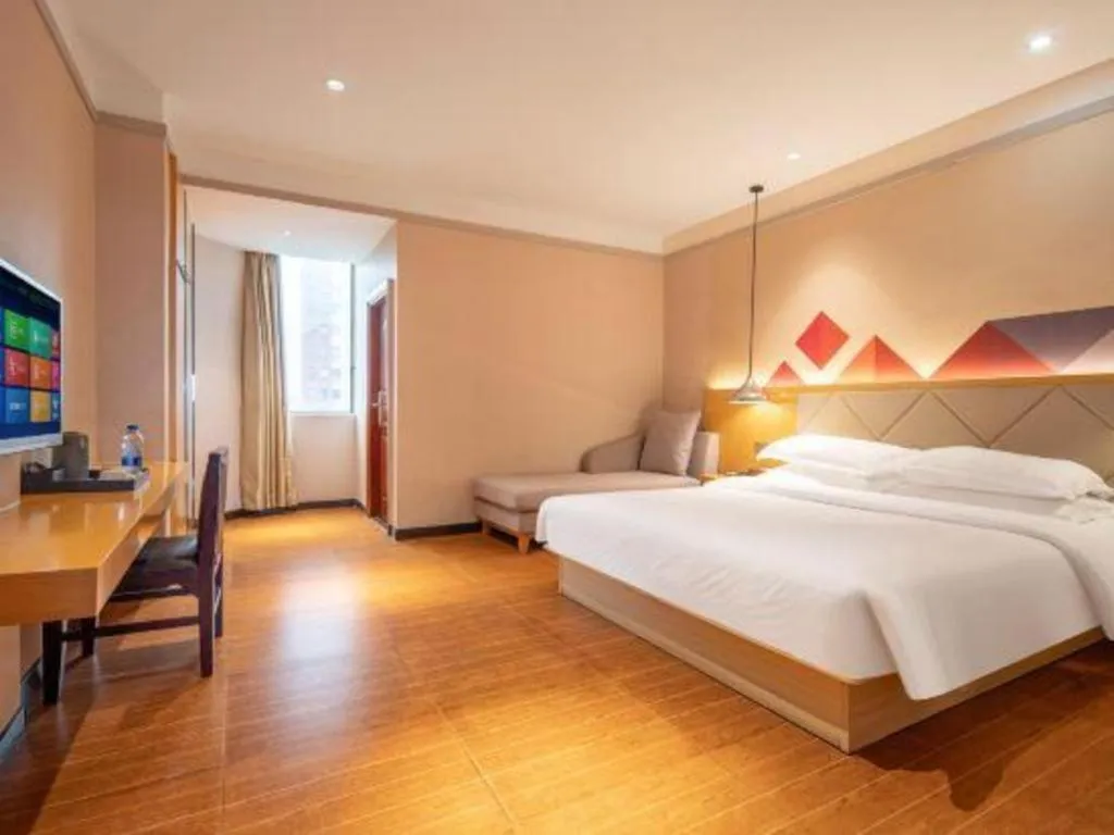 Bed in Borrman Hotel Dongguan Zhongtang