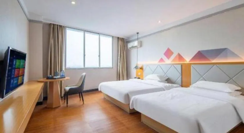 Bed in Borrman Hotel Dongguan Zhongtang