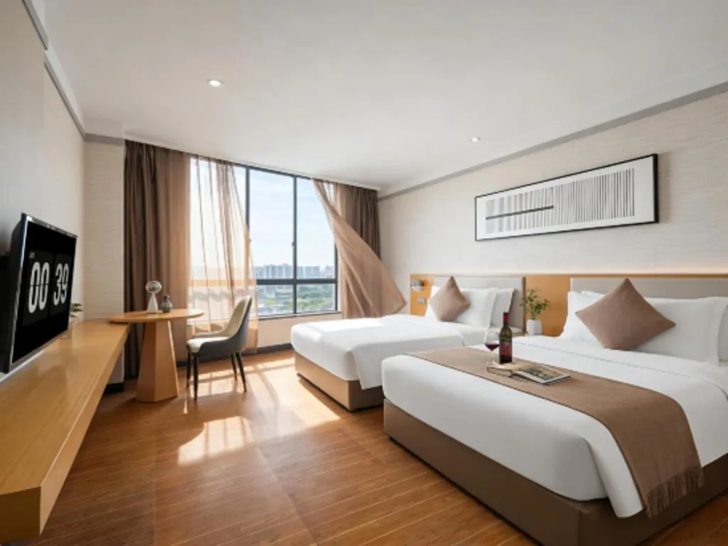 Bed in Borrman Hotel Dongguan Zhongtang