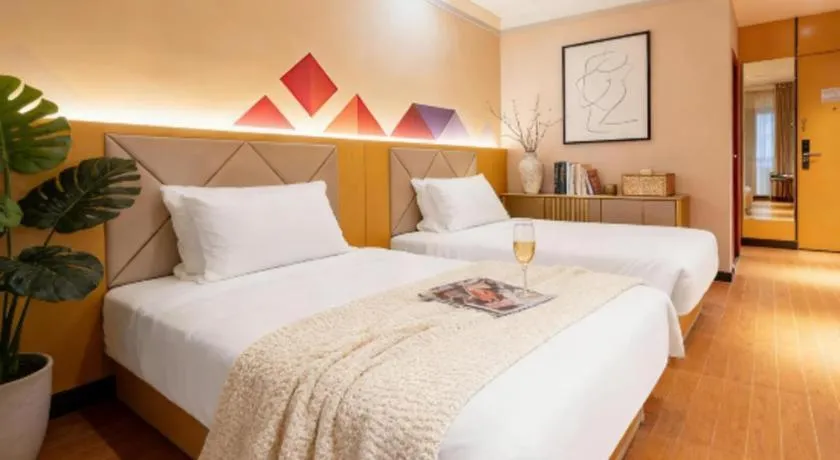 Bed in Borrman Hotel Dongguan Zhongtang