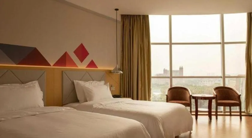 Bed in Borrman Hotel Dongguan Zhongtang