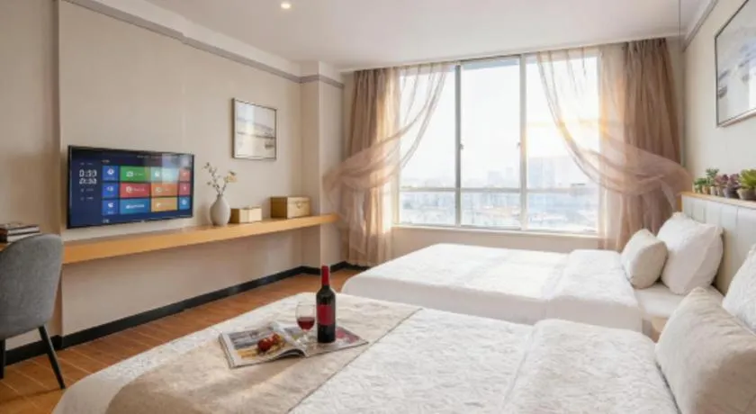 Bed in Borrman Hotel Dongguan Zhongtang