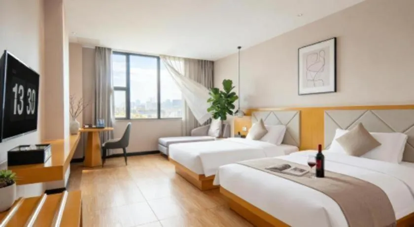 Bed in Borrman Hotel Dongguan Zhongtang