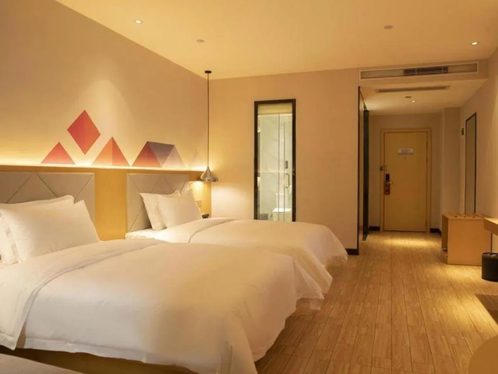 Bed in Borrman Hotel Dongguan Zhongtang